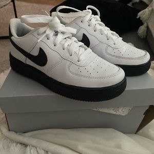 - Black and white Air Force 1’s